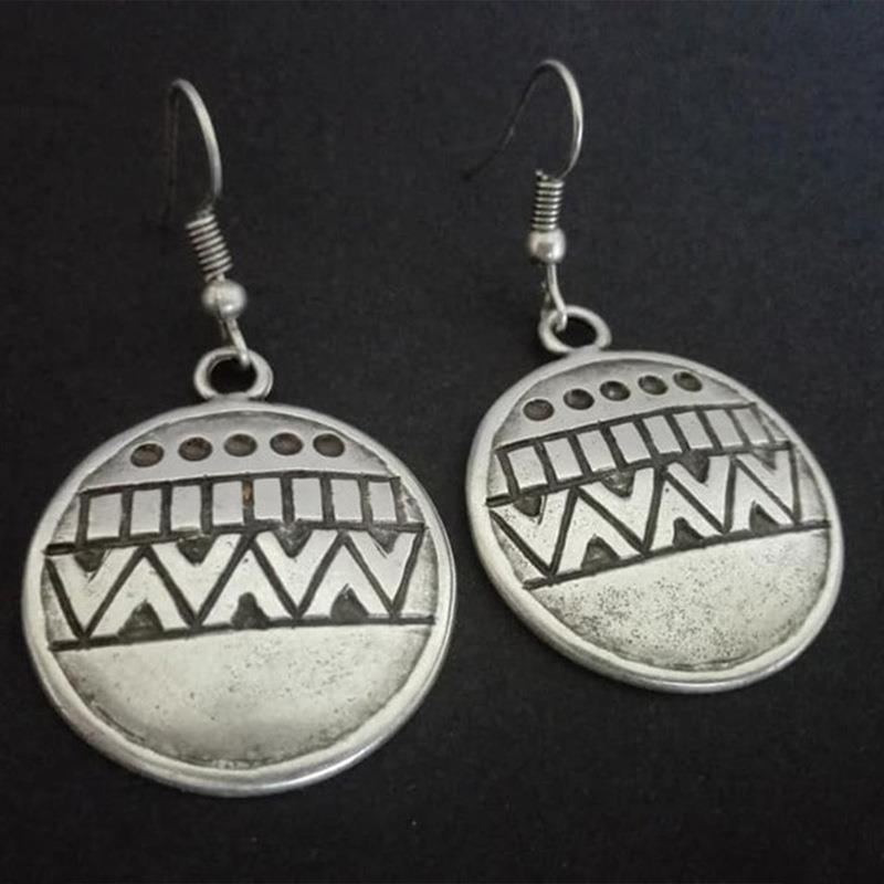 Vintage Tribal Round Carved Earrings