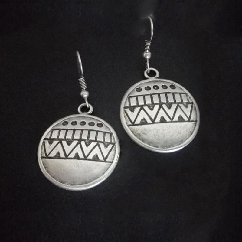 Vintage Tribal Round Carved Earrings